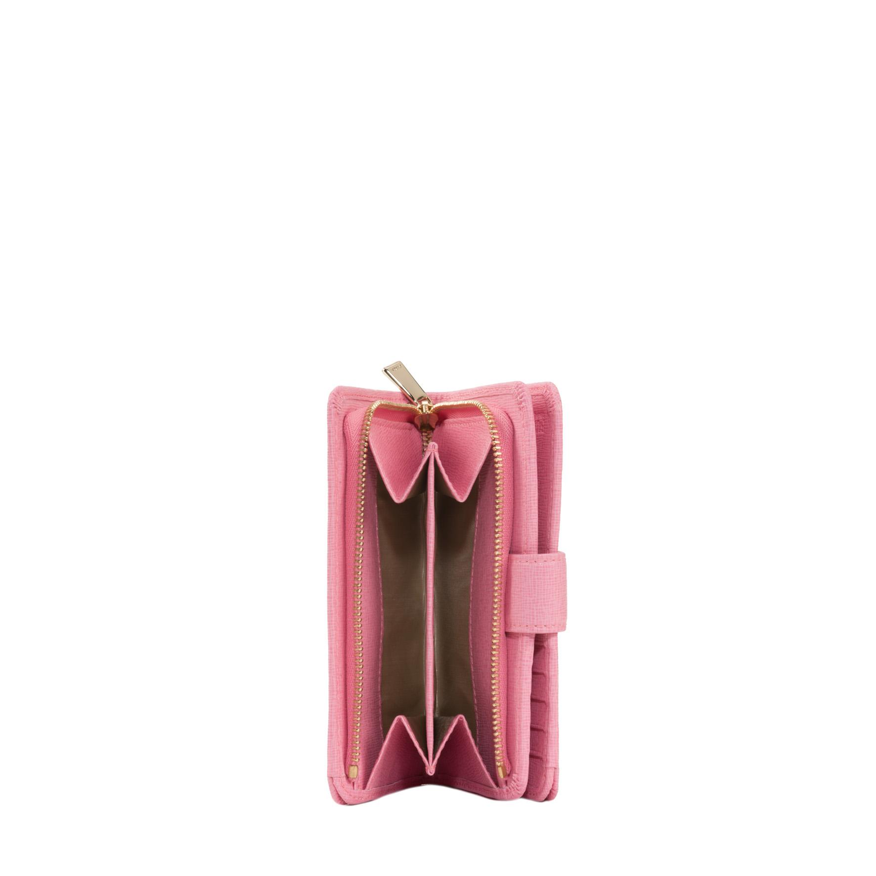 Dettaglio portafogli rosa portamonete con due scomparti e zip