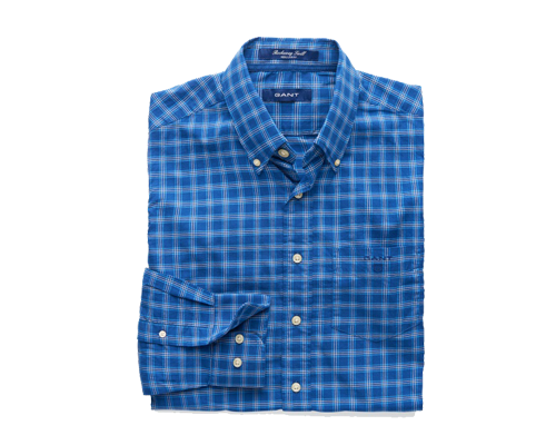 Camicia di colore dragon blue,con motivo a quadri con righe bianche e celesti, colletto classico button-down, polsini arrotondati, tasca a punta e stemma GANT ricamato tono su tono.